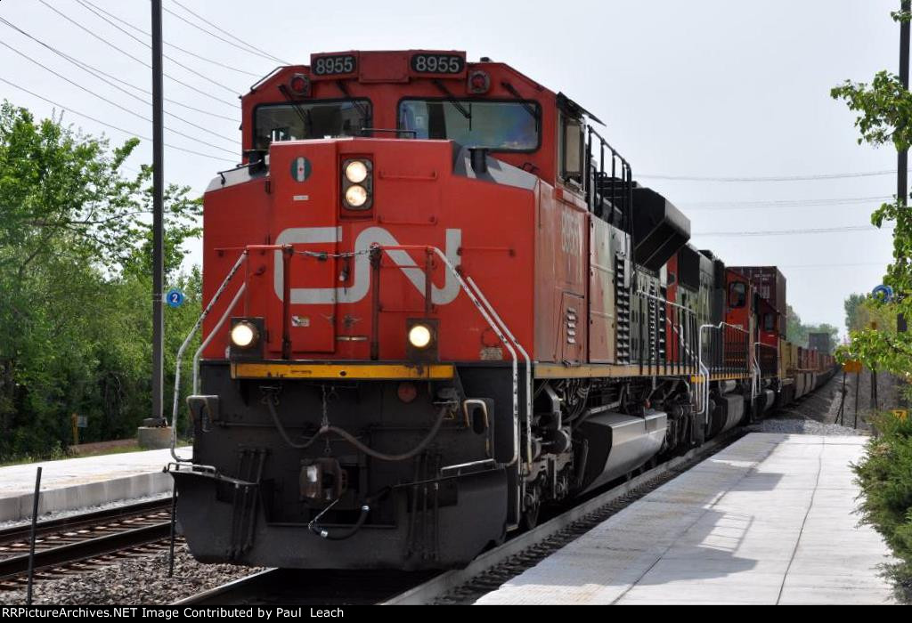 Westbound stack train comes though the station